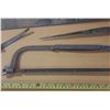 Image 3 : Vintage hand saws of different sizes.