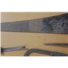 Image 6 : Vintage hand saws of different sizes.