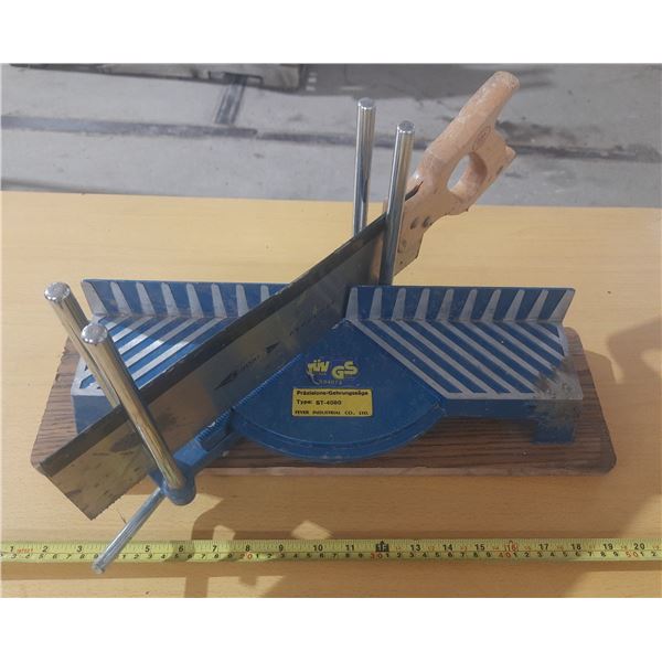 Feever Industrial manual miter saw for precision angle cutting.