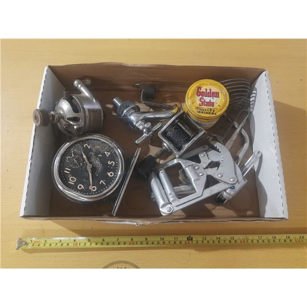 Collection of vintage tools and hardware items.