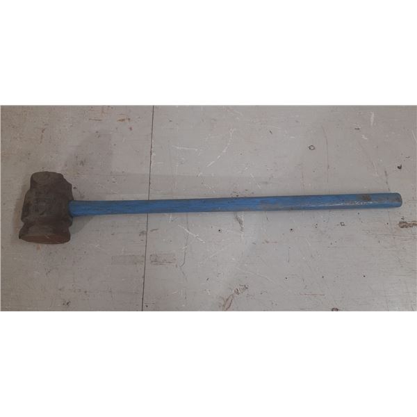 Heavy-duty sledge hammer. (Height 36")