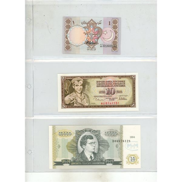Binder of Foreign Currency. (Uncirculated/All New) (Total 15 Notes)