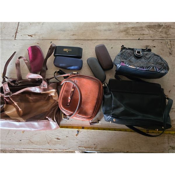 4 purses and glasses with cases