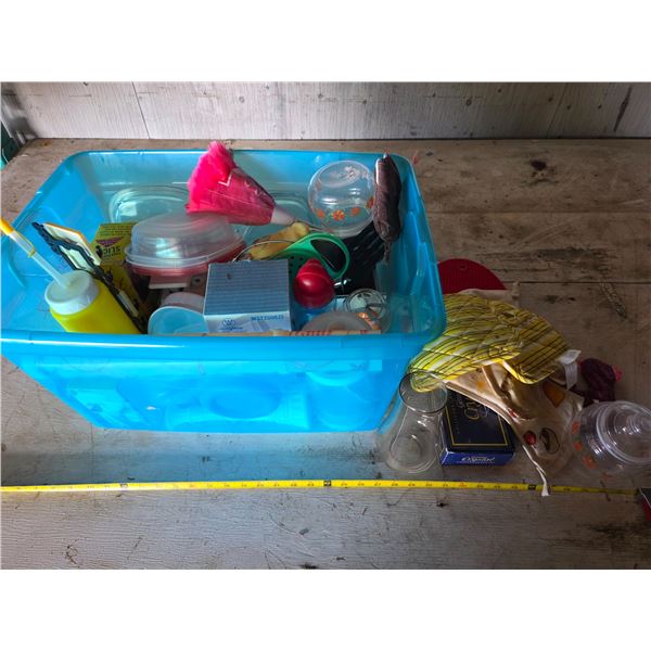 Tub full of kitchen items