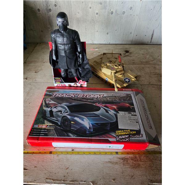 Lot of toys- lights and sounds tank, track storm