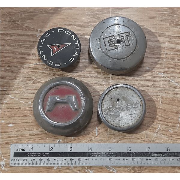 4 Small Hubcaps.