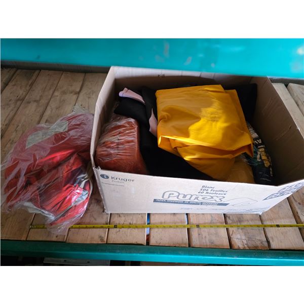 Lot of life jackets and wet suits