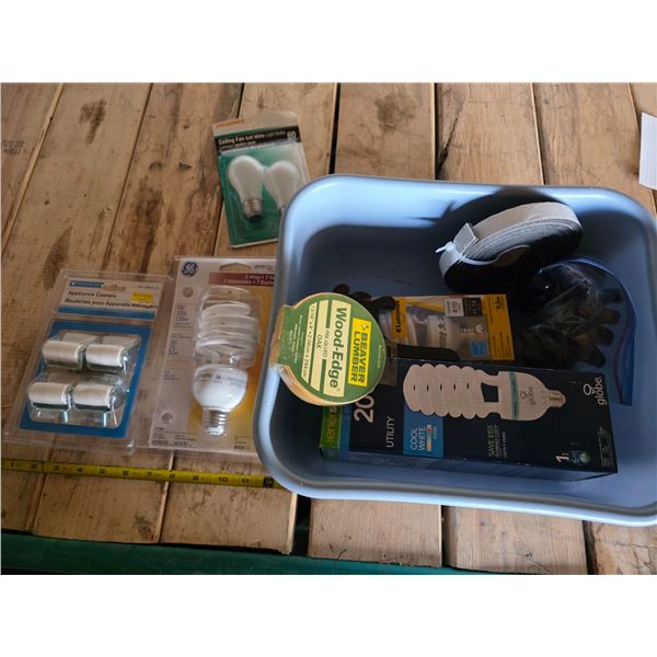 Assortment of light bulbs and caster wheels
