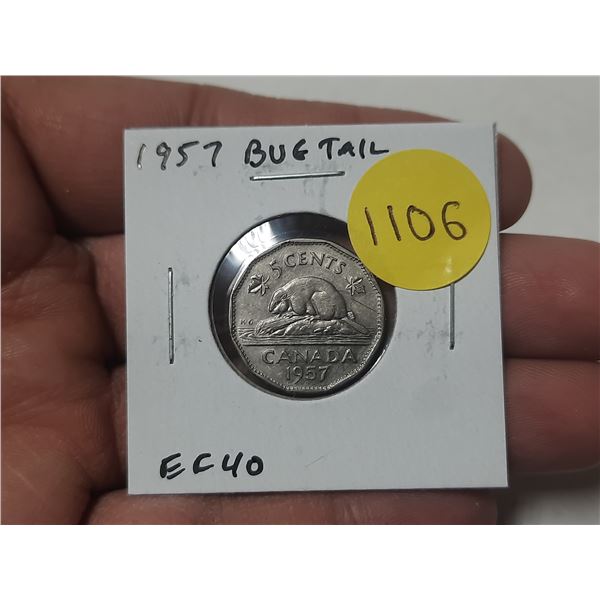 1957 Bug Tail Nickel 5 Cents. There is a small Die Chip on the end of the beaver’s tail tha