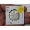 Image 1 : 1947 Curved Right 7 with 7 Over 7 Canadian Silver 50 Cents. VF30. Scarce.