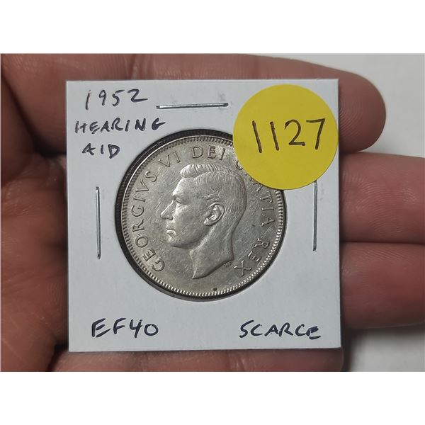 1952 Hearing Aid Canadian Silver 50 Cents. There is a Hearing Aid in the king’s ear from a 