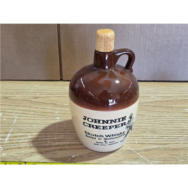 Johnnie creeper whisky jug
