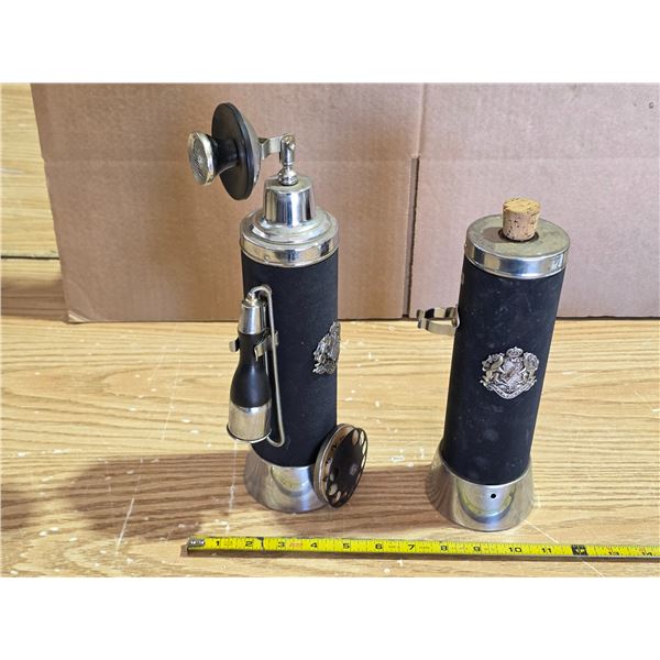 2 phone decanters-  is missing parts- works