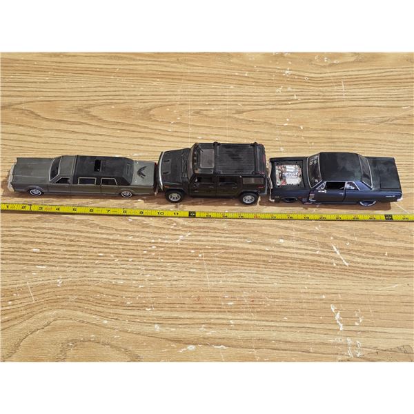 3 model cars- hummer, limo, chevy