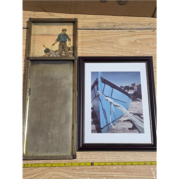 Hanging mirror and boat picture
