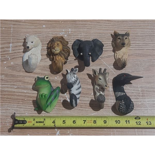 Vintage animal head wall hooks.