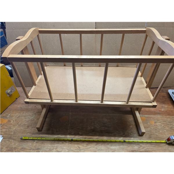 Wooden rocking doll cradle