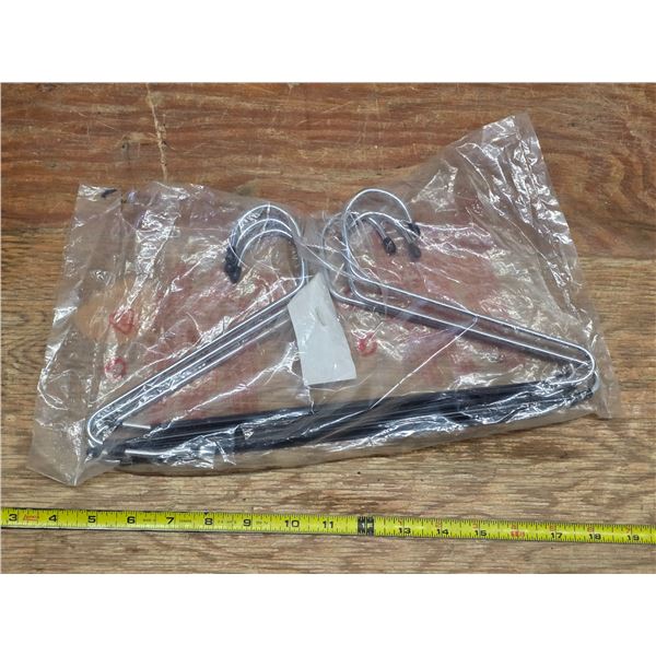 6 black coat hangers