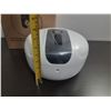 Image 3 : White wall-mounted center-feed roll paper dispenser featuring a central black panel for easy paper d