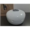 Image 4 : White wall-mounted center-feed roll paper dispenser featuring a central black panel for easy paper d