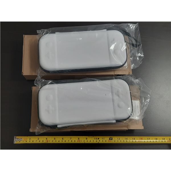 (2) Slim white carrying cases for the Nintendo Switch or OLED model. (New)
