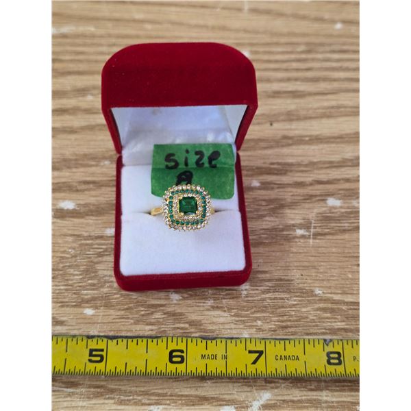 Size 8 ring with green stone