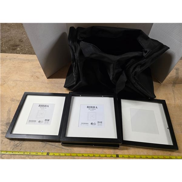 4 picture frames and a sports bag