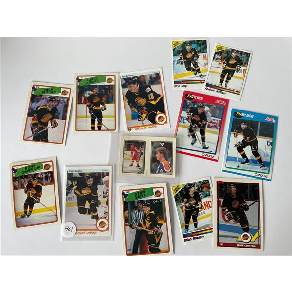 12 vintage hockey cards/stickers