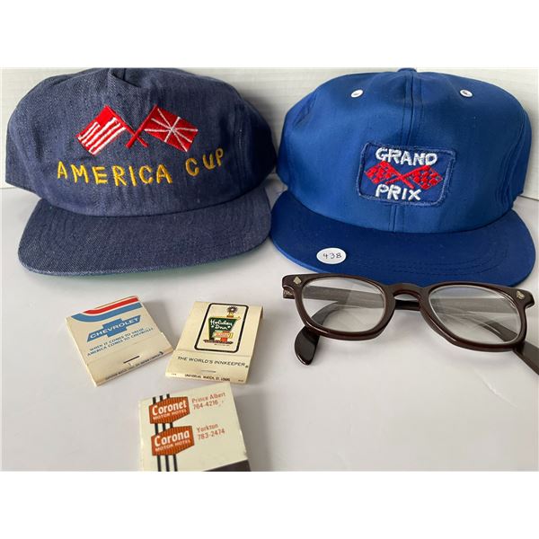 Old hats, glasses and vintage matchbooks