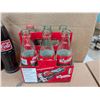 Image 7 : (4) Sealed Vintage Coke Bottles (5) Empty Bottles Coke