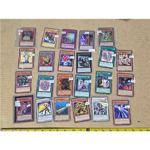 Assorted yo-gi-oh cards- super rares, rares, some first edition