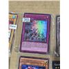 Image 3 : Assorted yo-gi-oh cards- super rares, rares, some first edition