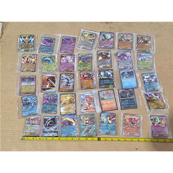 Assorted holo pokemon cards