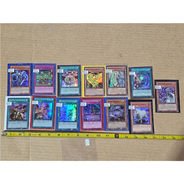 Assorted yu-g-oh cards, super rares, rares