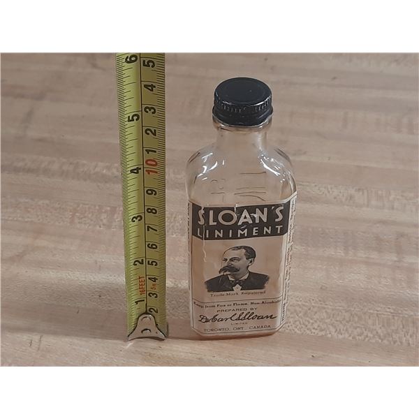 Vintage Sloan's Liniment Medicinal Bottle from Toronto, Canada. ( Less Than Half Filled)