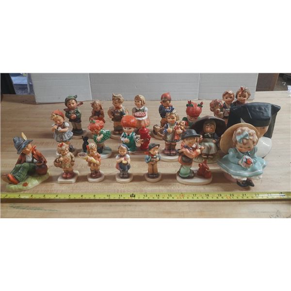 Collection of Vintage Goebel Hummel porcelain figurines made in German.