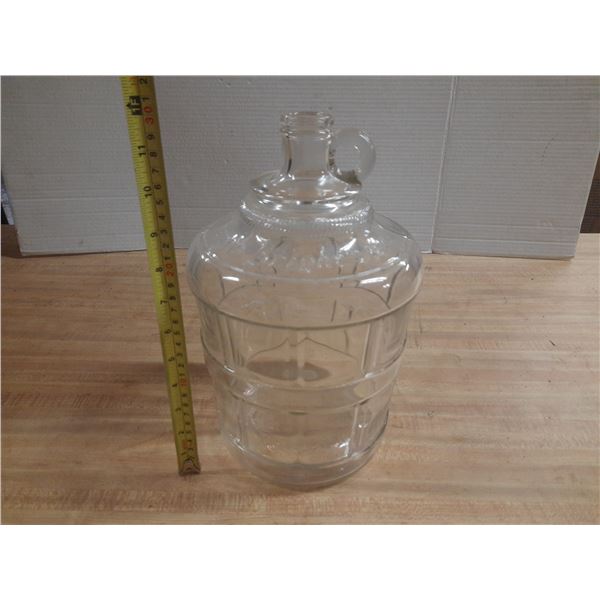 Vintage Bright's Wines clear glass jug with a side handle and embossed garland design.