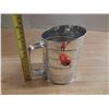 Image 1 : Vintage Bromwell's flour Sifter featuring a distinctive red wood knob on the hand crank.