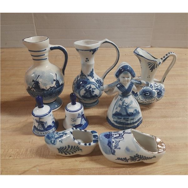 Collection of vintage Dutch Delft Blue ceramic pieces.