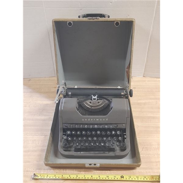 Vintage Underwood Leader portable typewriter in gray. (Untested)