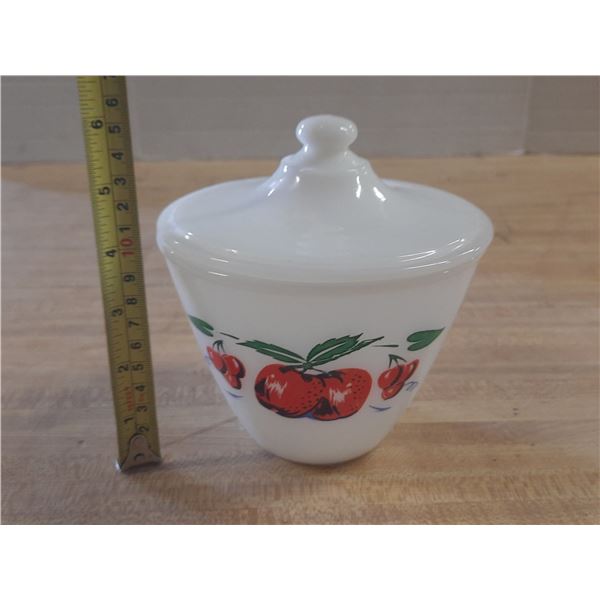 Vintage Fire King milk glass grease jar in the Cherry and Apple pattern with its lid.