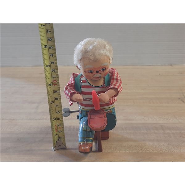 Vintage 1950s Alps Japan Little Shoemaker wind-up tin toy. (Working)