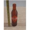 Image 1 : Vintage Orange Crush soda bottle from the 1930s to 1950s.