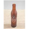 Image 3 : Vintage Orange Crush soda bottle from the 1930s to 1950s.