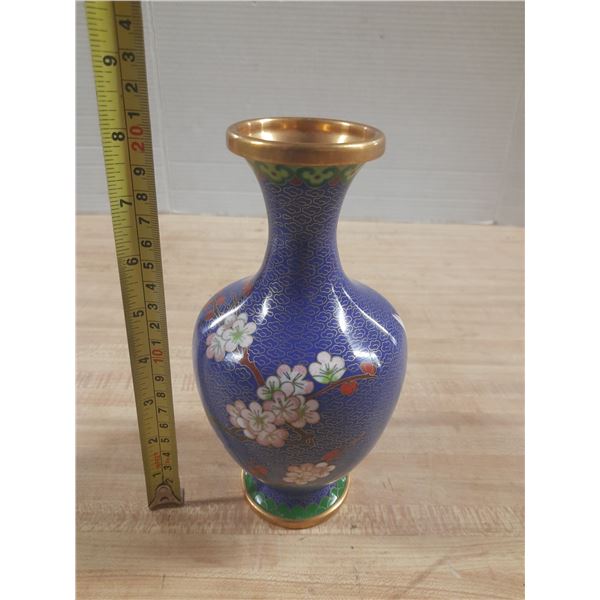 Vintage Chinese cloisonné vase featuring a vibrant blue background with a floral cherry blossom desi