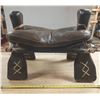 Image 2 : Vintage Middle Eastern or African camel saddle stool, featuring a dark brown leather seat and a carv