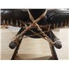 Image 8 : Vintage Middle Eastern or African camel saddle stool, featuring a dark brown leather seat and a carv