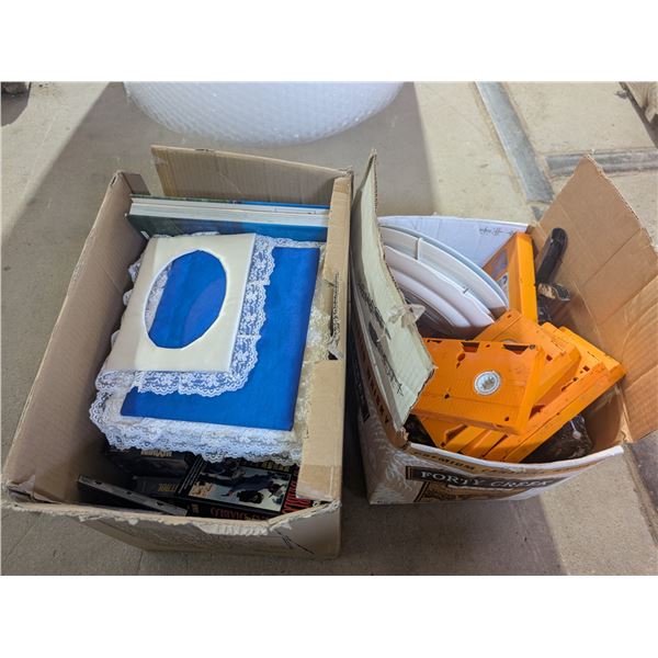 (2) Boxes of Misc. VHS Tapes, books, Decor Plates, and etc.