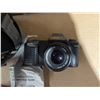 Image 2 : Canon T50 Camera w/ Carry Bag and Powers hot Guide Camera (Different instructions of a different cam