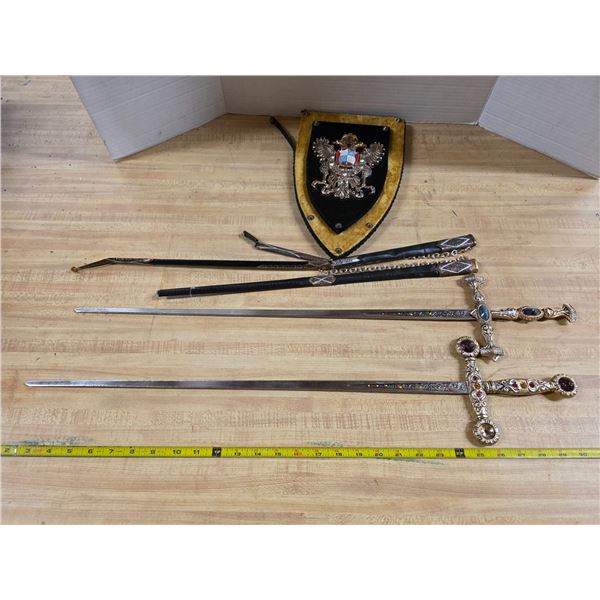 2 decorative swords and coat of arms- 25"L